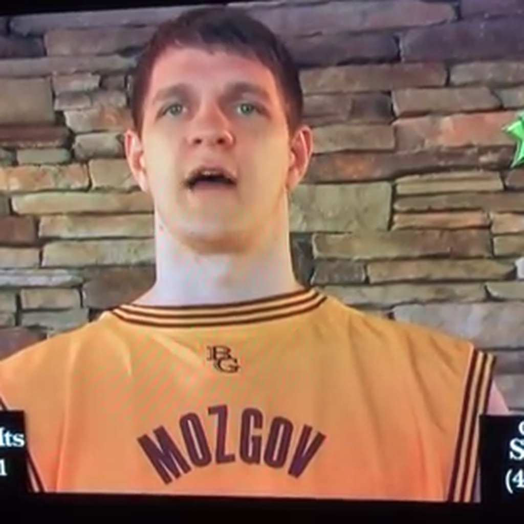 Picture of: Timofey Mozgov sells alcohol while wearing jersey backwards